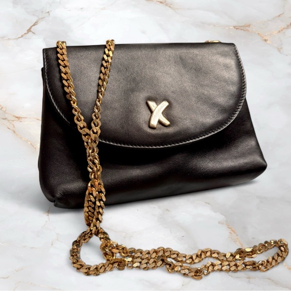 Paloma Picasso Handbags - Vintage Paloma Picasso Black Leather Crossbody Bag Gold "X" Logo